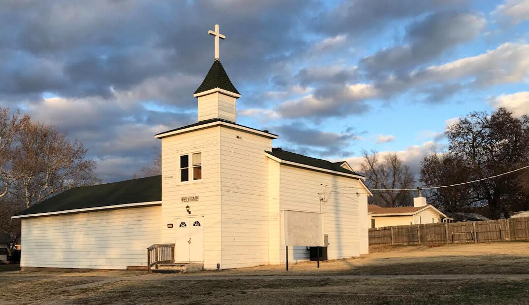 Saint Cate's Route 66 Folk Art Cathedral Exterior of Saint Cate’s Route 66 Folk Art Cathedral, a historic white clapboard church in Yukon, Oklahoma, beneath a dramatic Oklahoma sky.